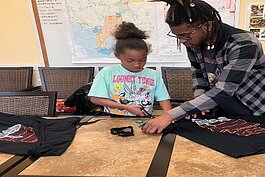 During a workshop at the Tampa Heights Junior Civic Association Community Center, local creatives and designers helped children and teens design outfits to showcase during Tampa Connect Fashion Week.