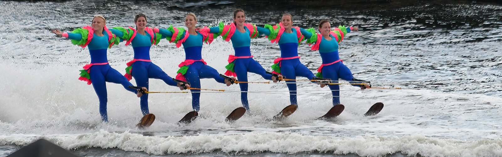 Holding their ropes with one foot, an all-female team performs during the Tampa Riverfest festival at the Water Works Park in Tampa.