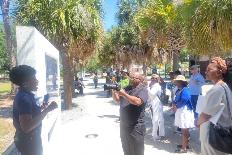 St. James at ENCORE Program Manager Ashley Morrow leads a Tampa Bay History Center walking tour through downtown Tampa's historic Central Avenue district.