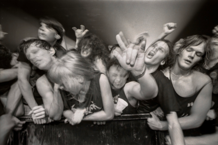 Photographer Jay Nolan gives an artist talk on the exhibit "Fandom: Celebrating Rock & Roll" at the Florida Museum of Photographic Arts on December 19th. 