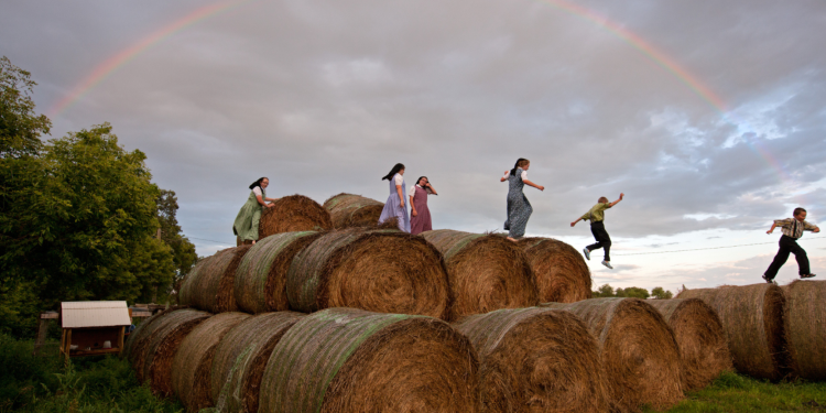 Manitoba, Canada-based photographer Tim Smith's exhibit "The Hutterites: In the World but Not of It" is at the Florida Museum of  Photographic Arts from April 10th through June 29th.