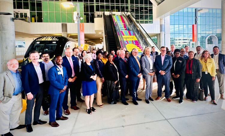A contingent of Tampa and Hillsborough County officials and community leaders at the Orlando Brightline station in November 2023 