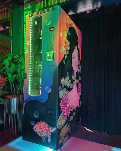 Vivid mural art covers a Lucid Vending machine