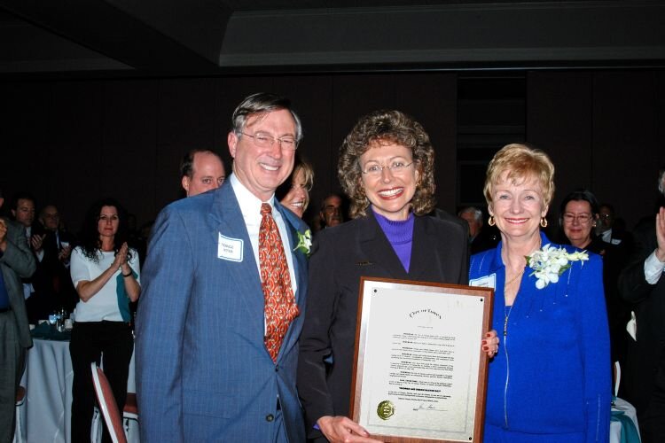 Community Foundation of Tampa Bay founders George and Debbie Baxter with then-Tampa Mayor Pam Iorio at a 2005 event honoring the Baxters 