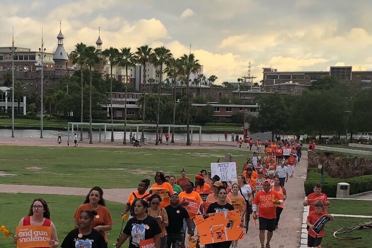 The peace walk at the Wear Orange event to end gun violence in downtown Tampa on National Gun Violence Awareness Day.