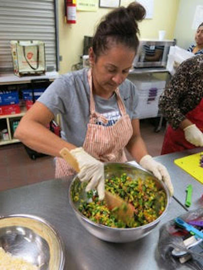 Jilue Johnson prepares vegetarian tacos