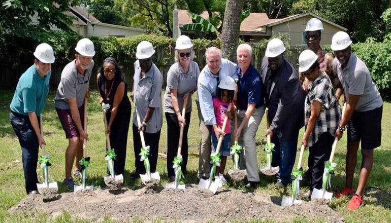 Community leaders break ground on the second phase of the Nehemiah Project Sept. 10.