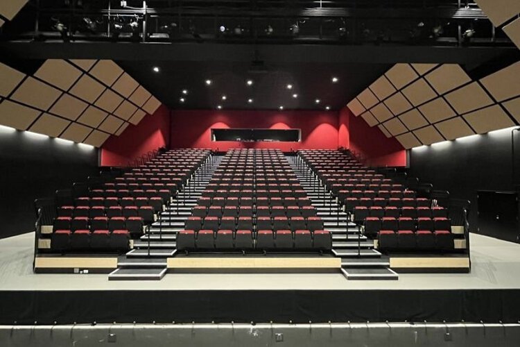 The theater at the New Tampa Performing Arts Center has a maximum seating capacity of approximately 350.
