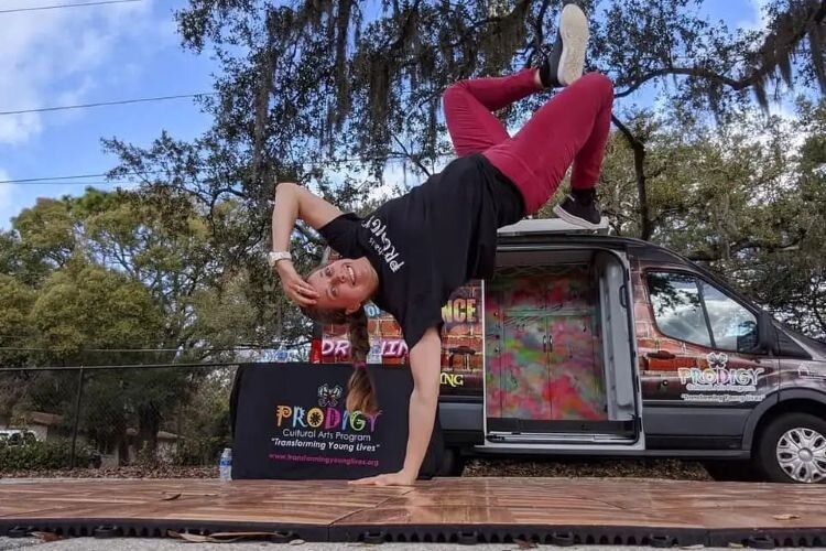 The Prodigy Moves program uses two vans to bring painting, hip-hop dance, and other art offerings directly into the community.