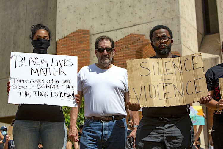 City Councilman Joseph Citro joins the protestors at Tampa City Hall.