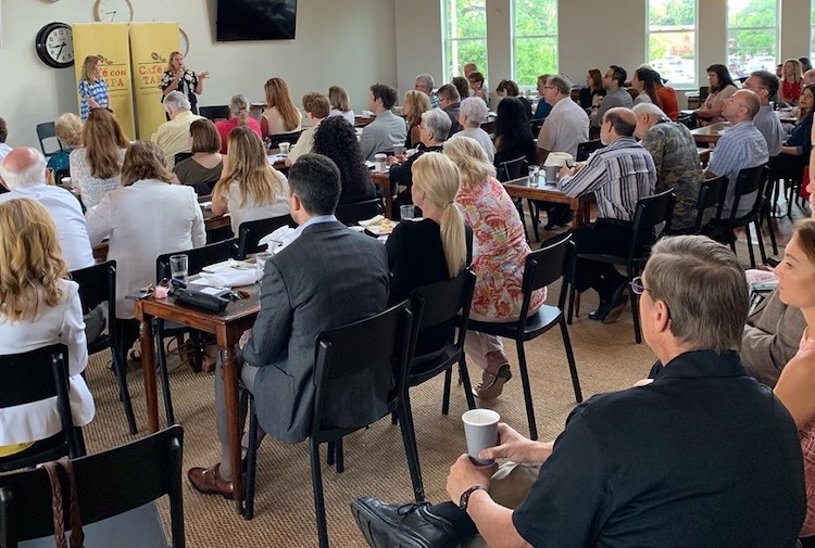 Cafe con Tampa audience for discussion about sidewalks.