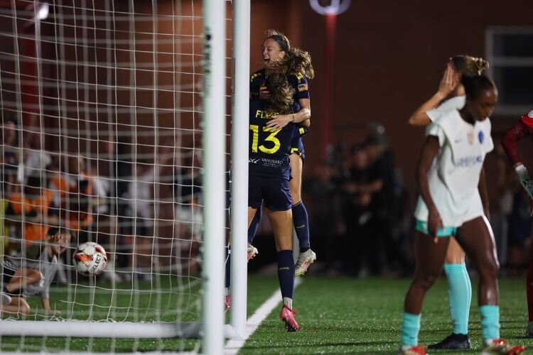 Cecilie Fløe celebrates her extra time goal in the USL Super League championship