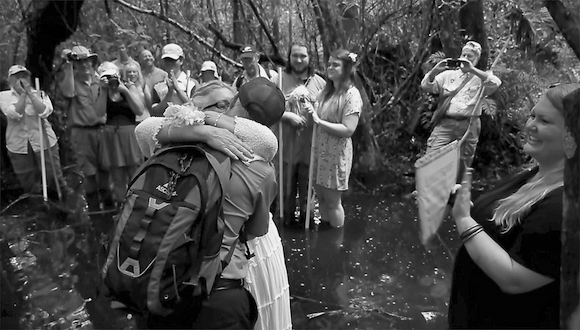 Mike Owen and Donna Glann-Smyth marry near a ghost orchid-bearing tree in the Fakahatchee Preserve State Park.