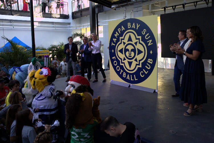 Tampa Bay Sun FC co-owners Darryl Shaw and David Laxer, Tampa Mayor Jane Castor, co-owner Jeff Fox, head coach Denise Schilte-Brown, and club President Christina Unkel at an unveiling event for the team’s name, colors and logo.