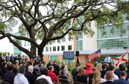 Crowd awaits unveiling of electric vehicles at USF