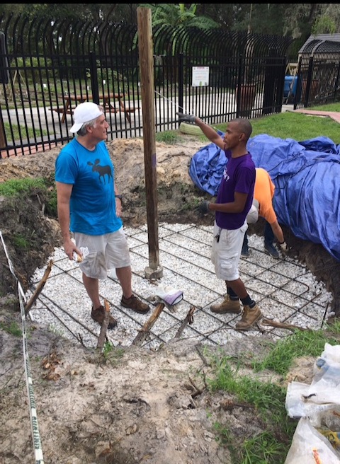 Junior Polo, the lead artist behind the Harvest Hope Park public art project, at work.